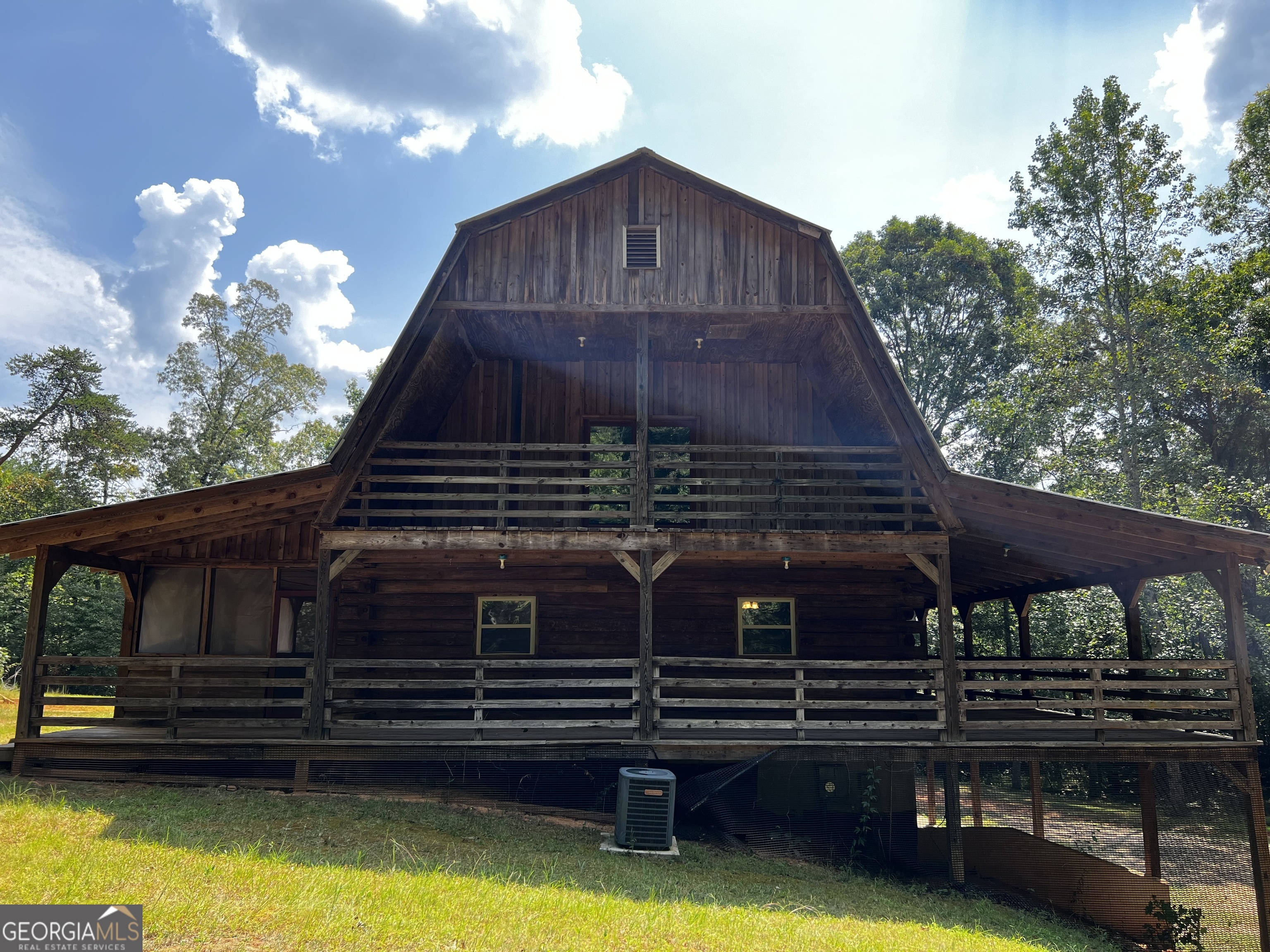 997 Turnerville Circle Clarkesville, GA 30523 - Photo 1 of 1 a view of a wooden house with a yard