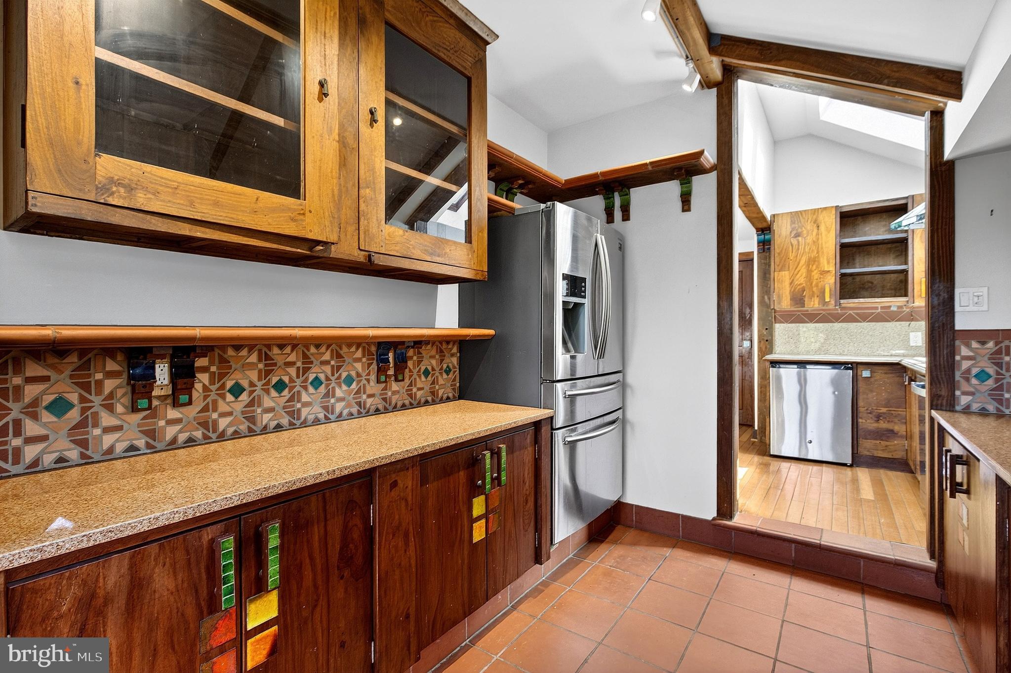 498 Perrineville Road Robbinsville, NJ 08691 - Photo 14 of 59 a kitchen with stainless steel appliances granite countertop a refrigerator and a stove