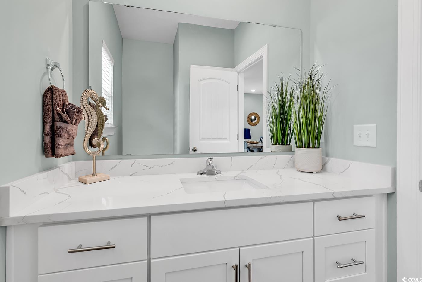 306 6th Avenue North Myrtle Beach, SC 29577 - Photo 11 of 28 Bathroom featuring vanity