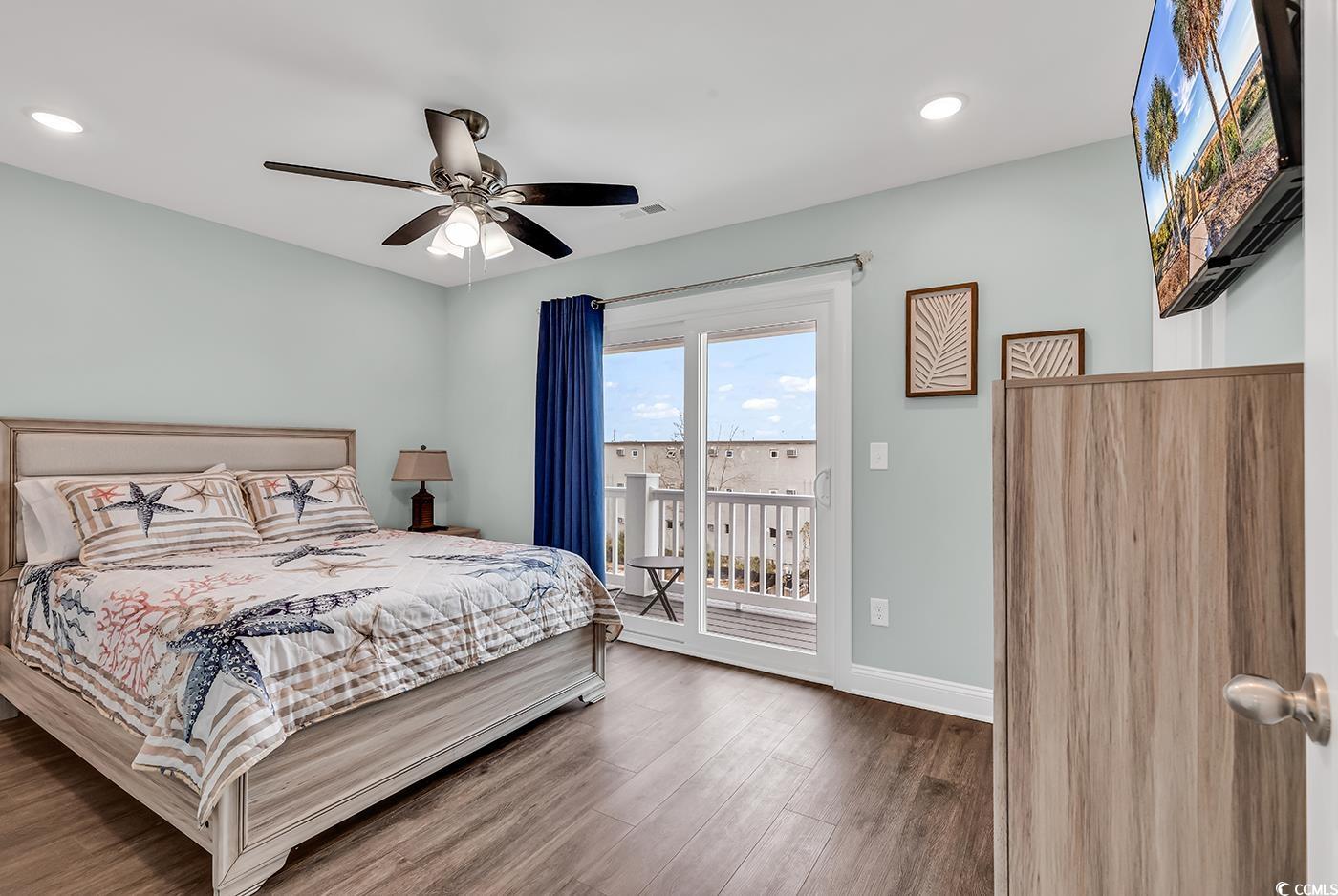 306 6th Avenue North Myrtle Beach, SC 29577 - Photo 15 of 28 Bedroom with wood finished floors, access to exterior, a ceiling fan, and recessed lighting