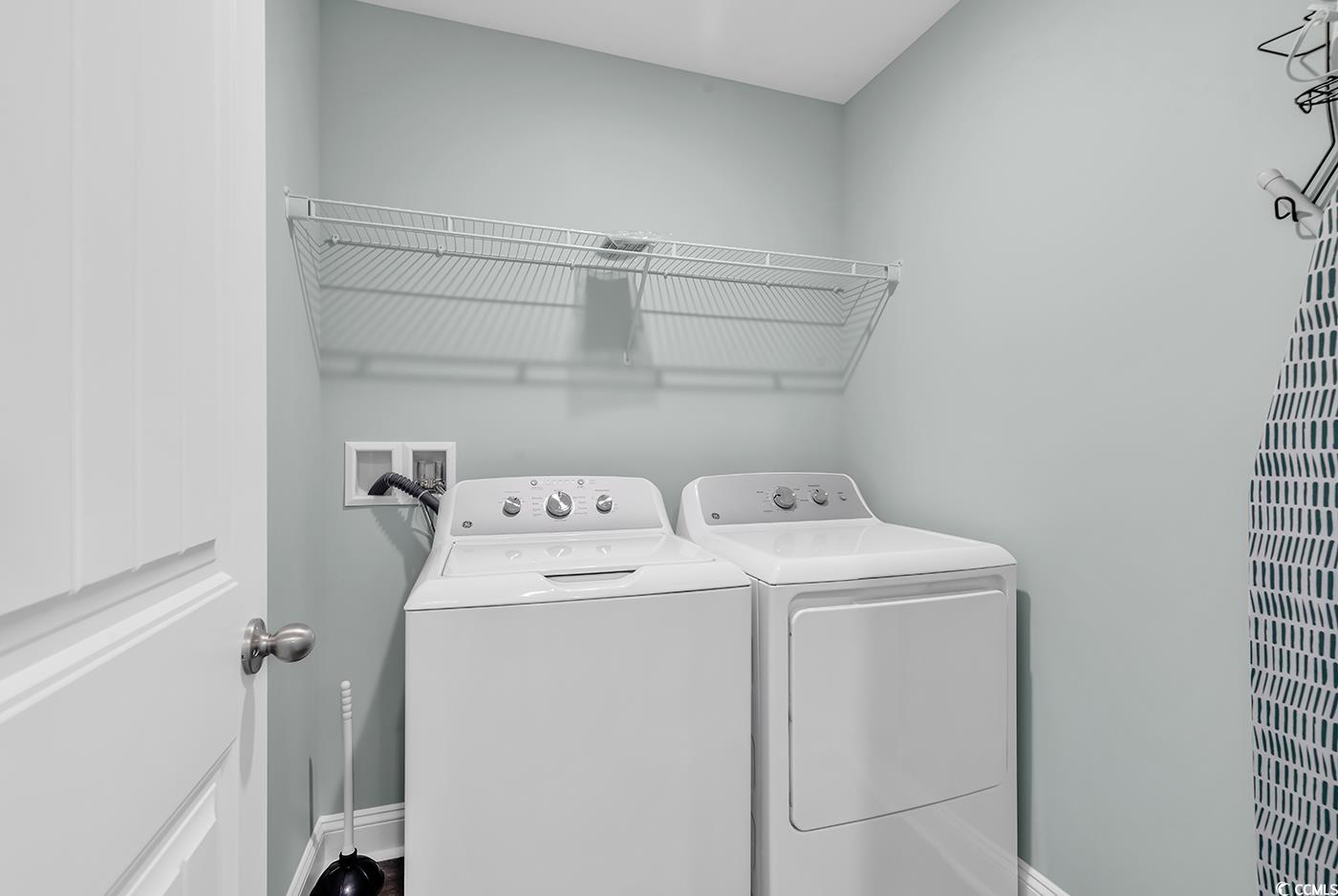 306 6th Avenue North Myrtle Beach, SC 29577 - Photo 21 of 28 Washroom with baseboards and washing machine and dryer