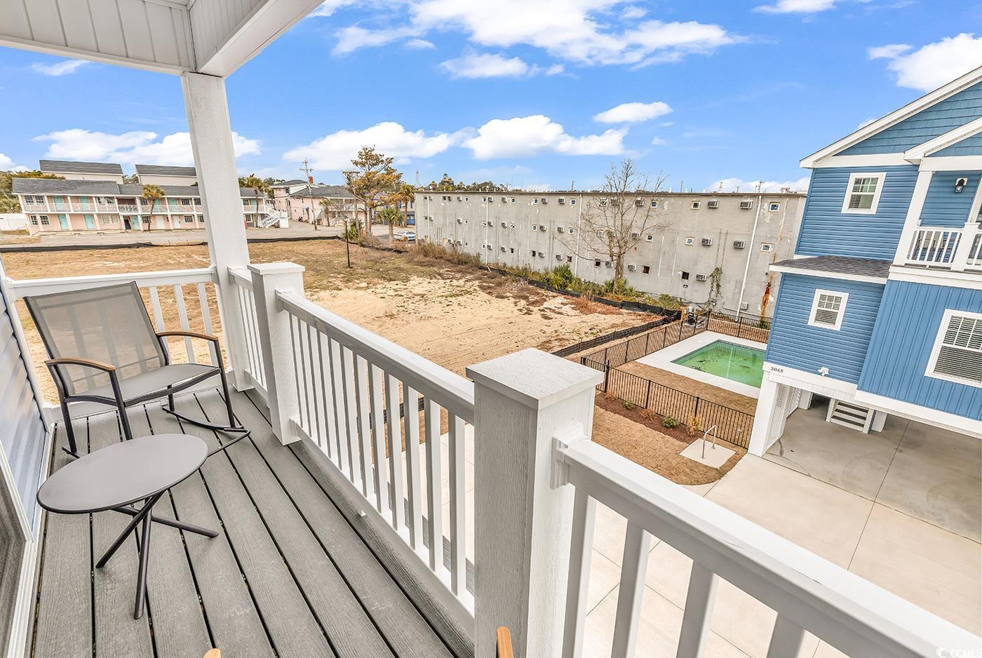 306 6th Avenue North Myrtle Beach, SC 29577 - Photo 24 of 28 Balcony featuring a residential view