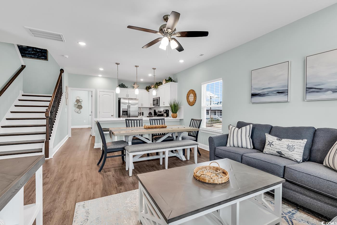 306 6th Avenue North Myrtle Beach, SC 29577 - Photo 6 of 28 Living area featuring stairway, light wood-style flooring, recessed lighting, and ceiling fan