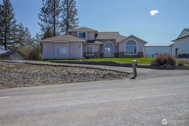 a front view of house with yard