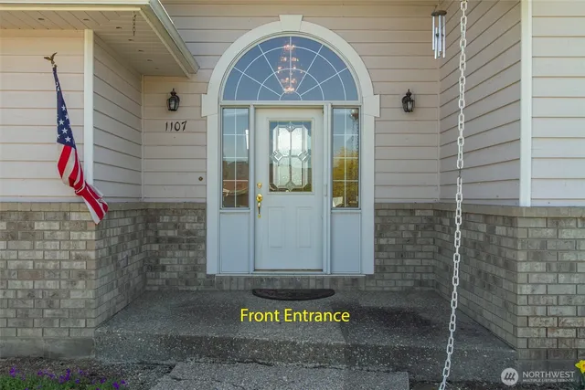 a front view of a house with a garage
