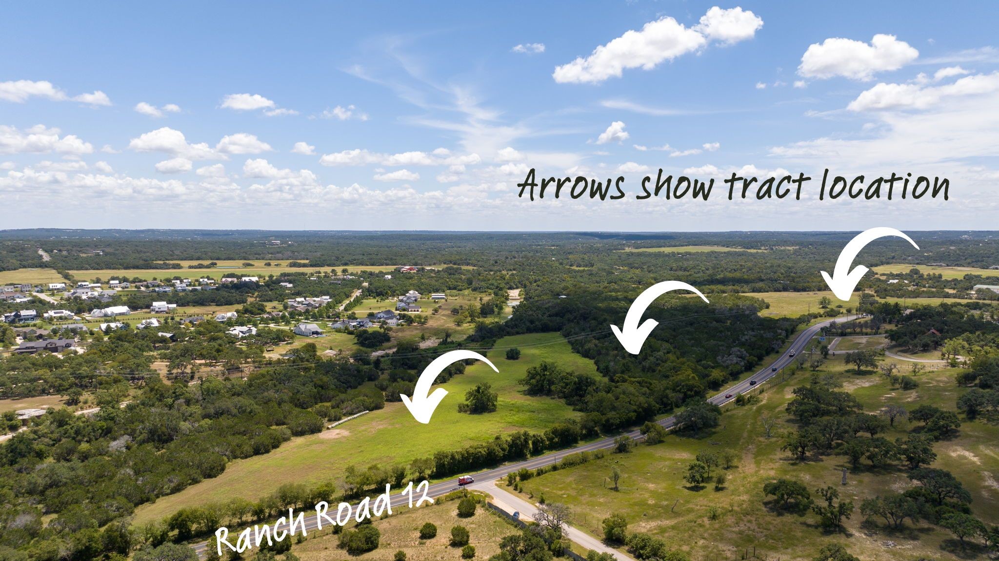 12 Ranch Road 12 Driftwood, TX 78619 - Photo 4 of 21 Bird's eye view from the Ranch Road 12 frontage (approximately 3,300 feet) looking East/Southeast. The Howard Ranch subdivision can be seen opposite of the tract. Hog Hollow Rd is the intersecting road in the foreground.