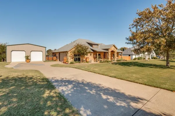 a house view with a outdoor space