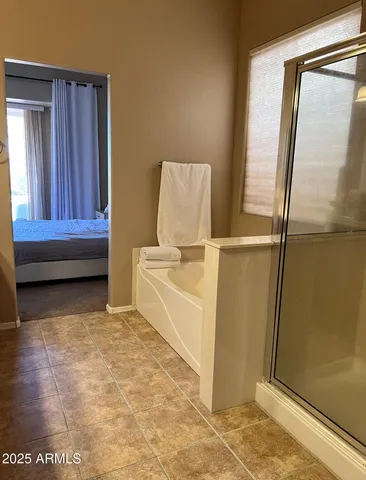 a view of front door and bedroom