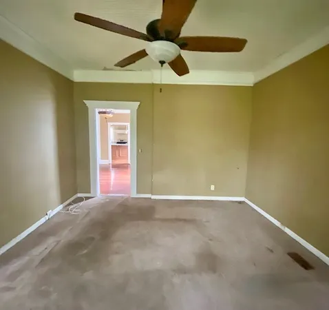 a view of livingroom with hardwood floor and hallway