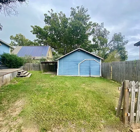 a house view with a garden space
