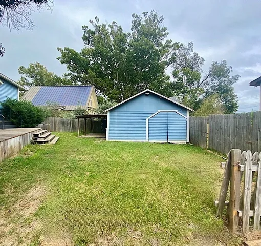 a house view with a garden space