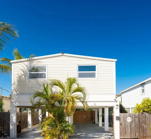 a front view of a house with glass windows