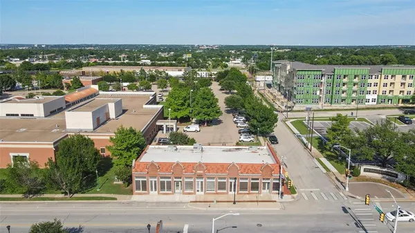 an aerial view of a city with lots of residential buildings