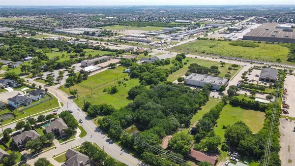 an aerial view of a house with a outdoor space
