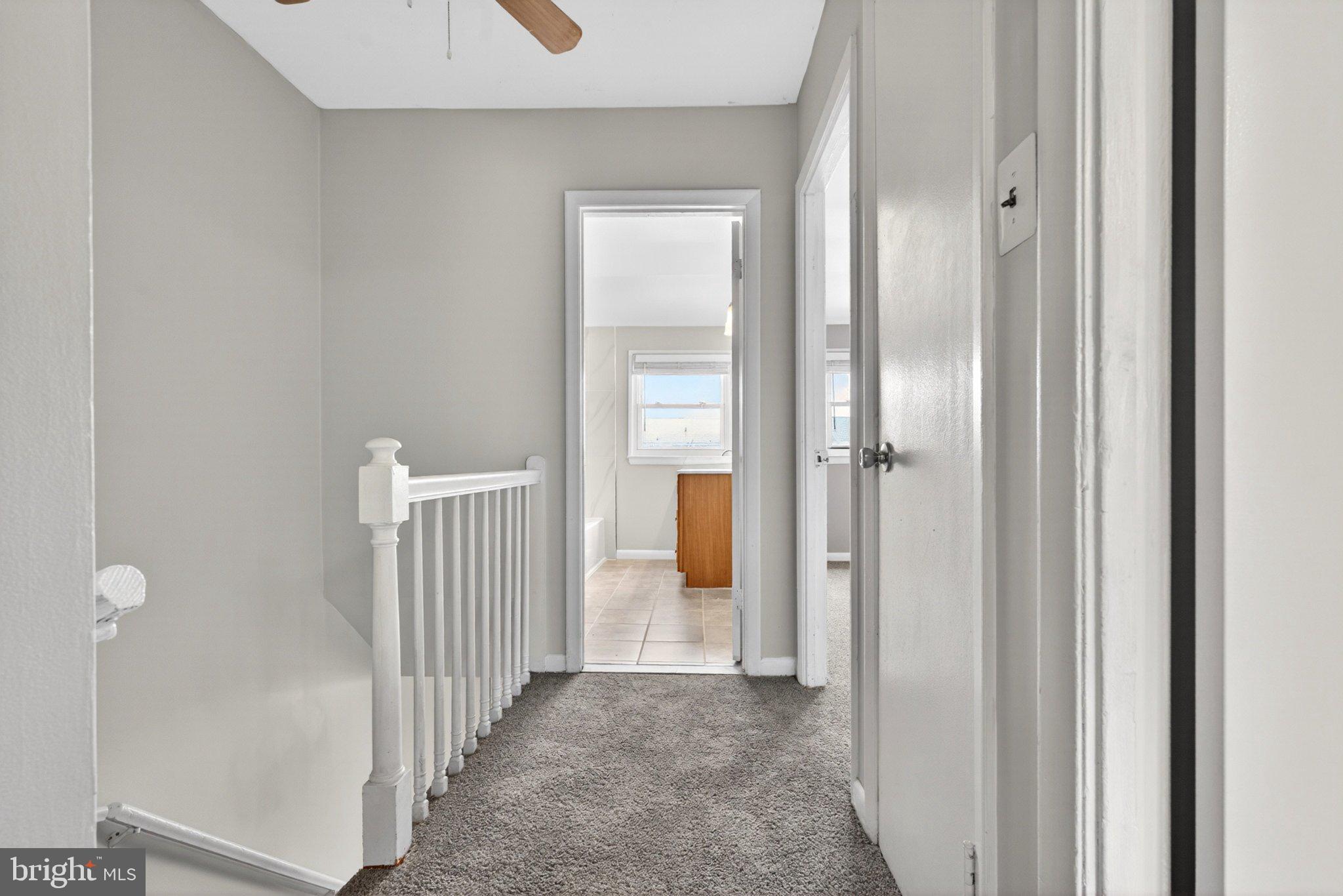 7729 Charlesmont Road Baltimore, MD 21222 - Photo 21 of 38 Bright and inviting hallway retreat.