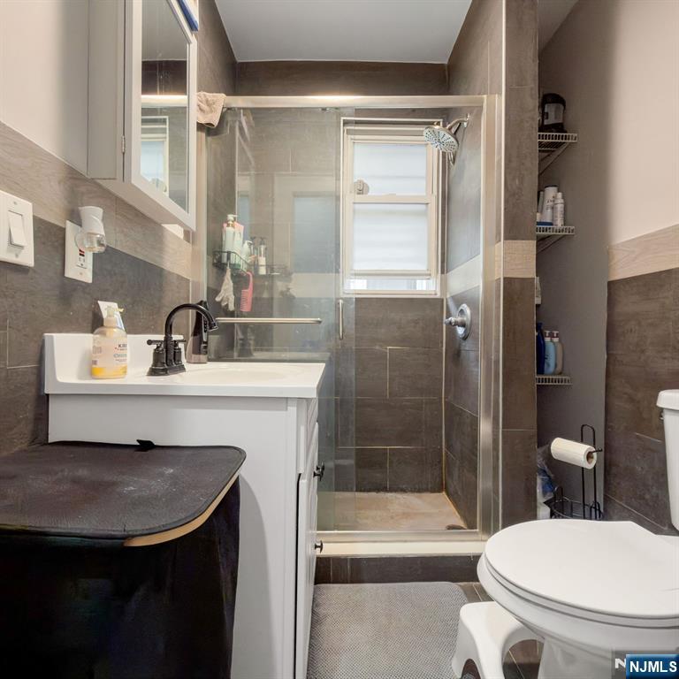 76 Mission Street Montclair, NJ 07042 - Photo 38 of 50 a bathroom with a sink toilet and shower