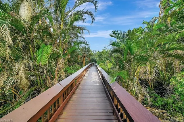 a view of balcony and yard