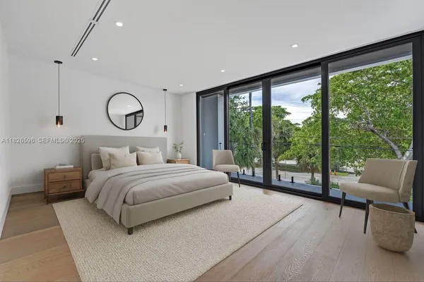 a living room with a couch and a walk in closet