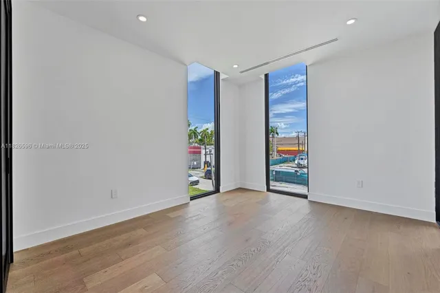 a close view of a sink and a mirror in the wall