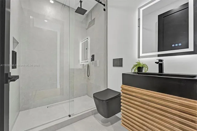 a view of backyard with cabin