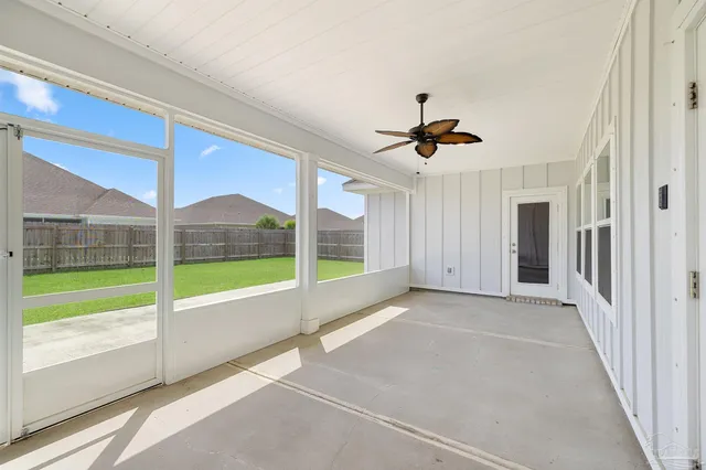 a view of an entryway with a ceiling fan