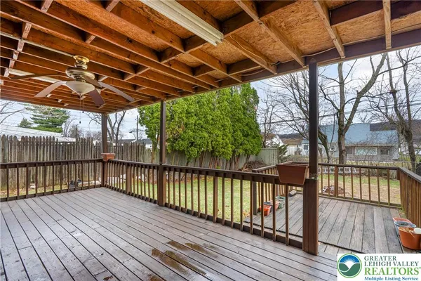 a view of balcony with wooden floor