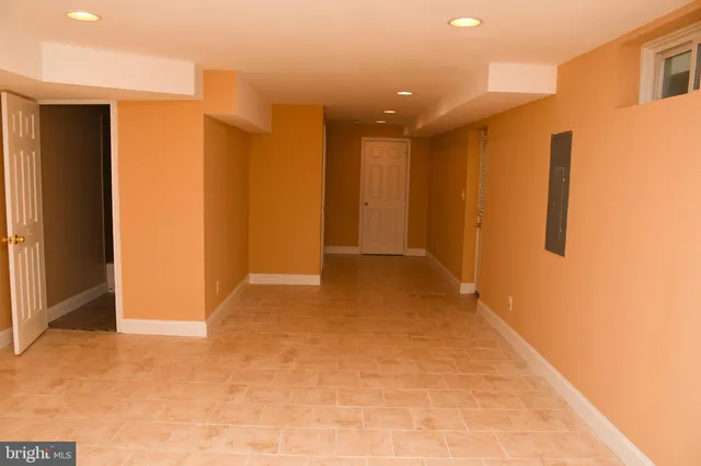 a view of hallway with a large window