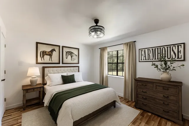 a view of hallway with wooden floor