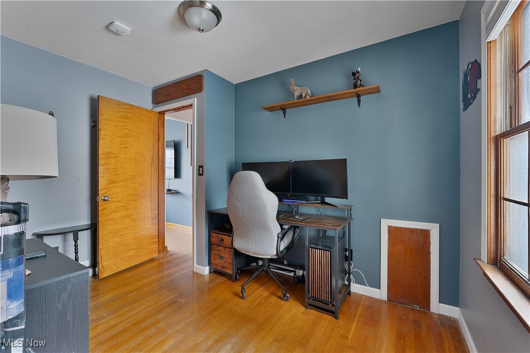 2702 Brunswick Road Youngstown, OH 44511 - Photo 14 of 18 Home office featuring wood finished floors and baseboards