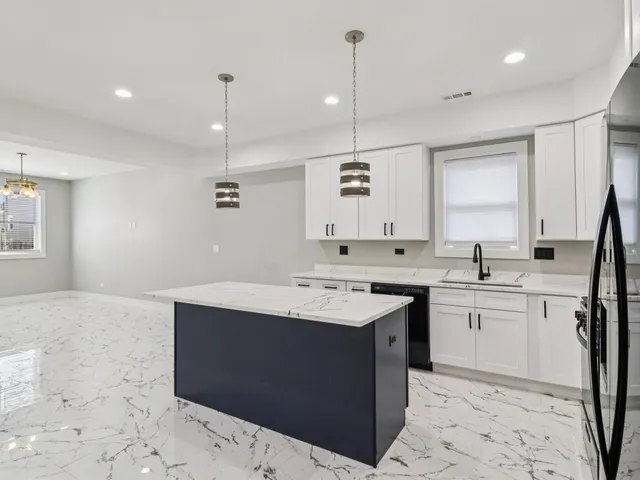 a view of hallway with wooden floor