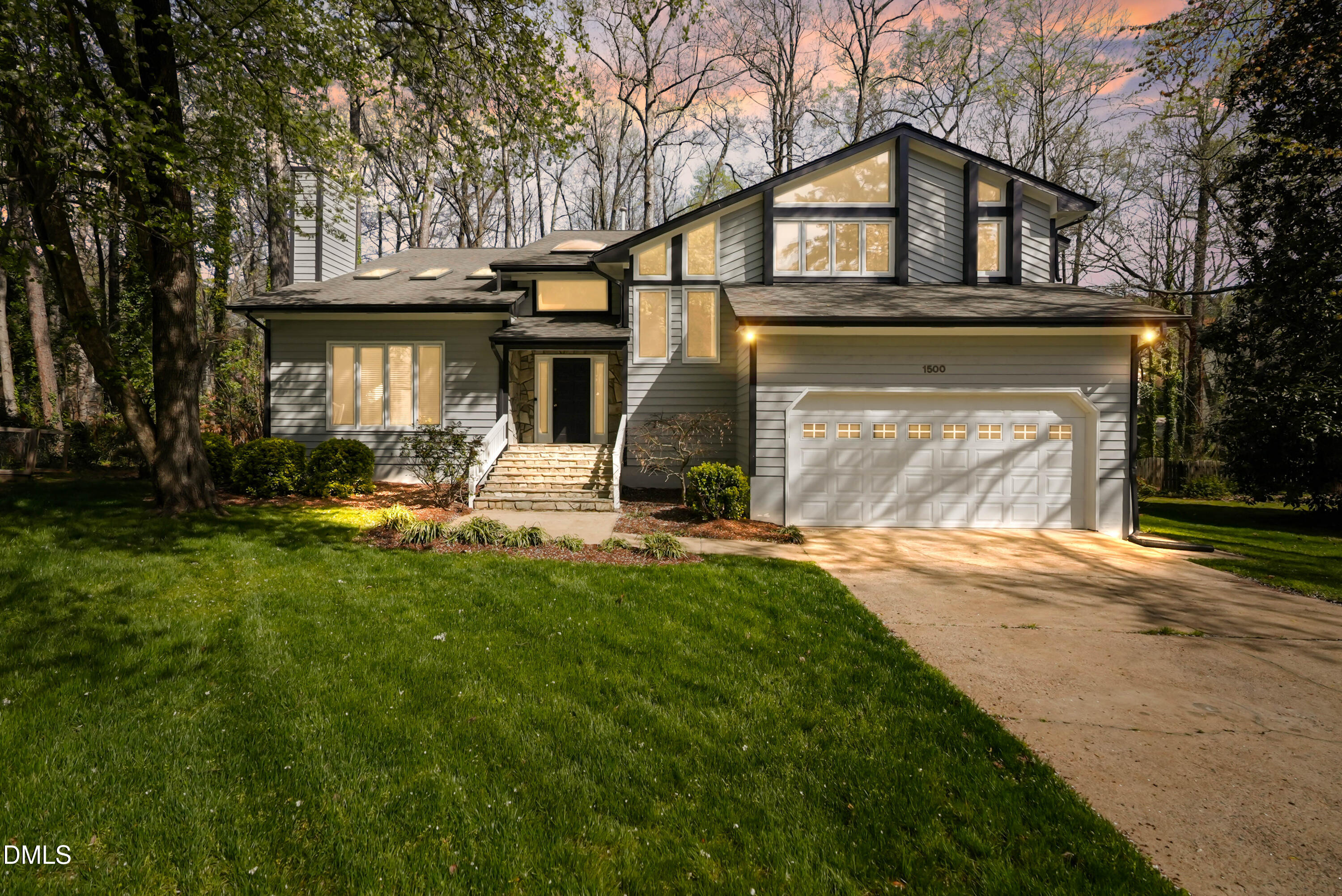1500 Surfbird Court Raleigh, NC 27615 - Photo 2 of 47 a front view of a house with a yard