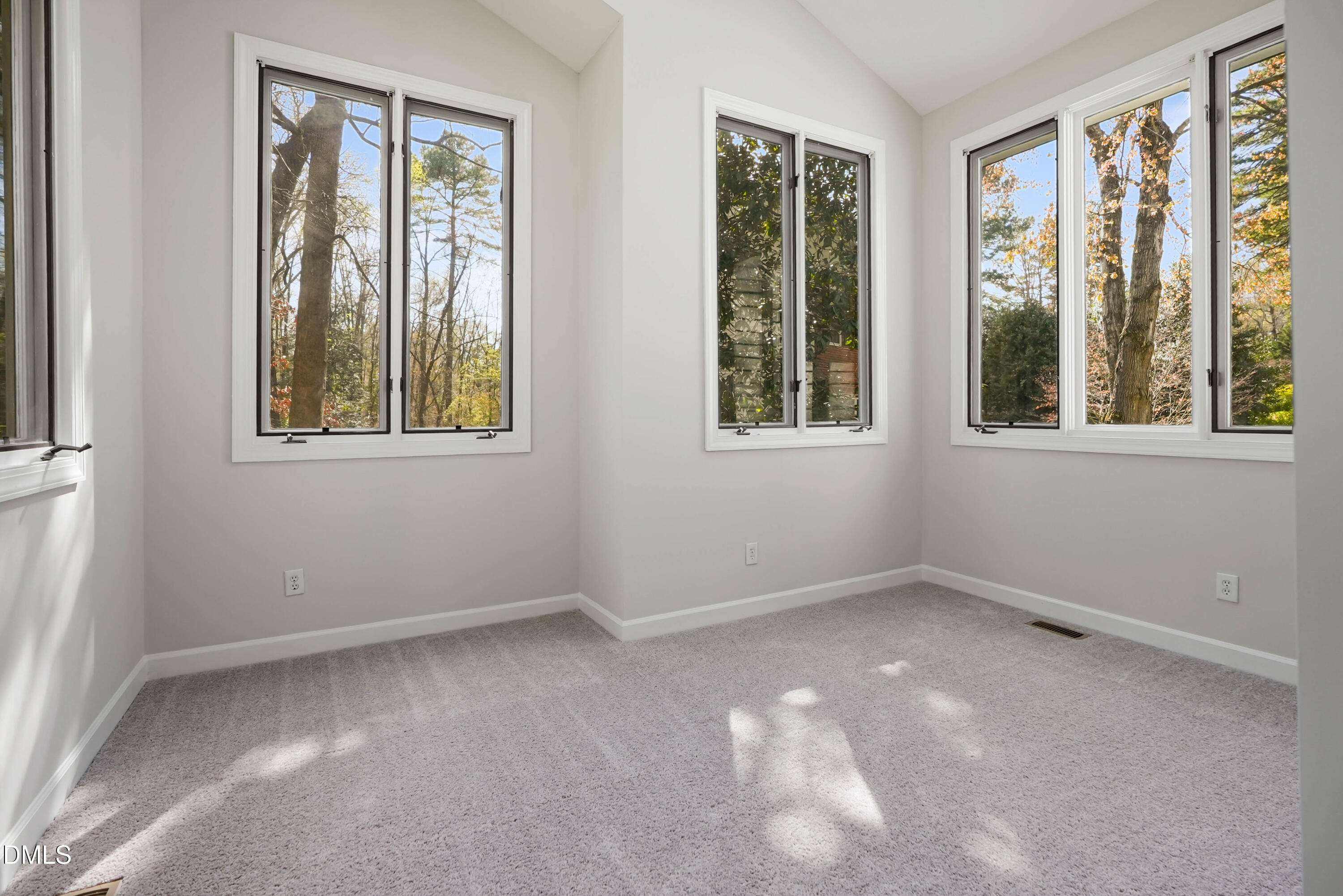 1500 Surfbird Court Raleigh, NC 27615 - Photo 21 of 47 an empty room with windows