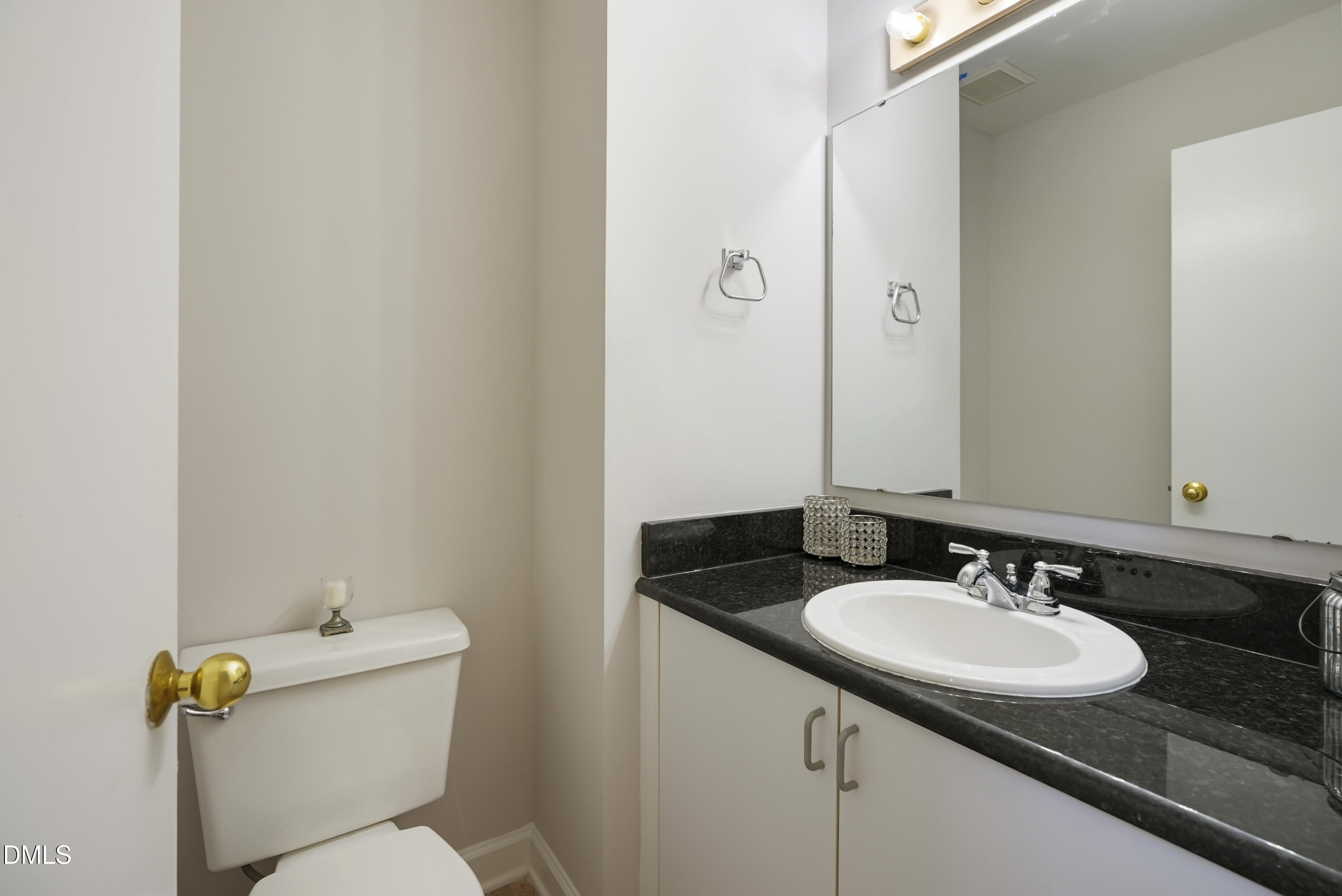 1500 Surfbird Court Raleigh, NC 27615 - Photo 26 of 47 a bathroom with a sink and a toilet