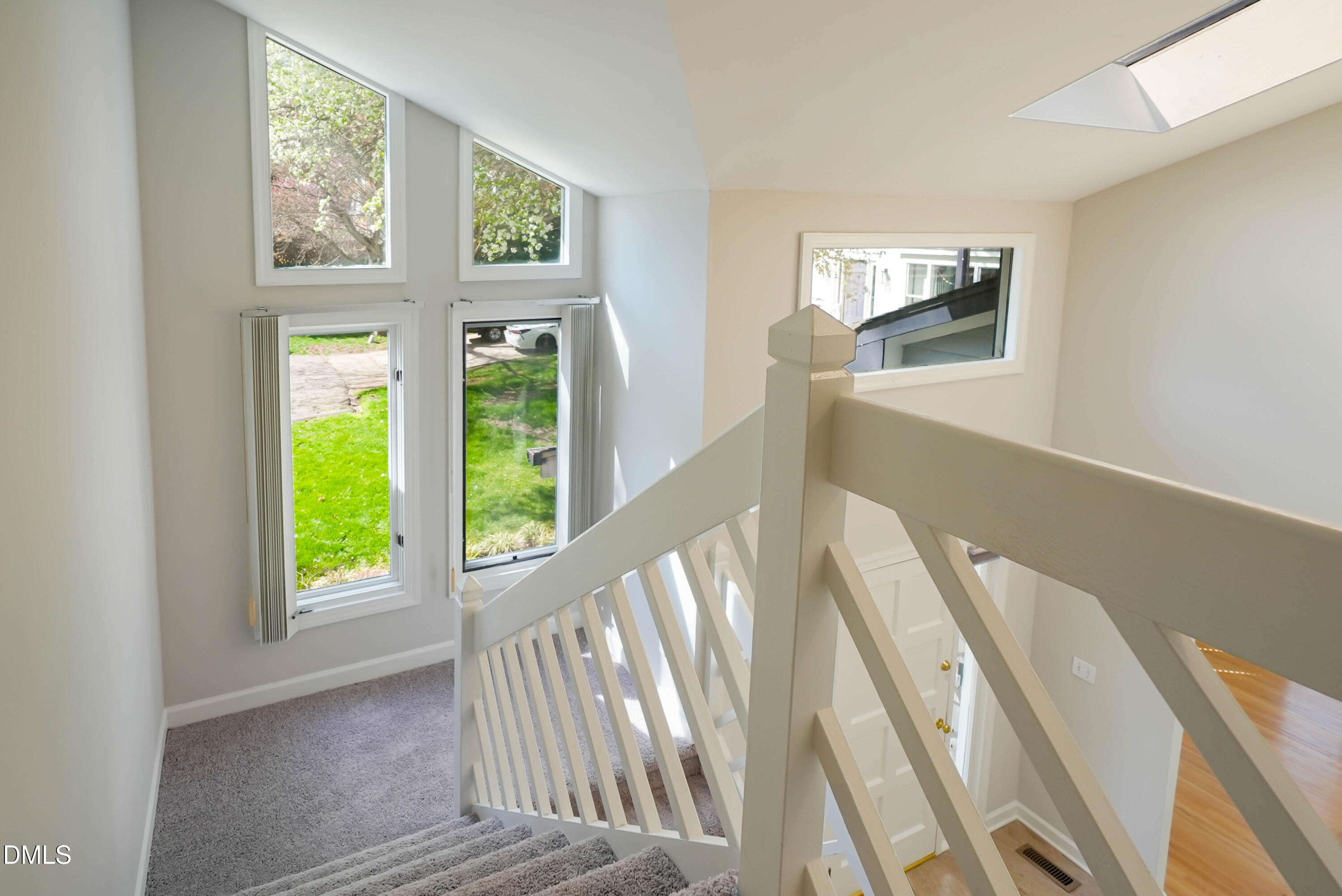 1500 Surfbird Court Raleigh, NC 27615 - Photo 28 of 47 a view of an entryway with wooden floor