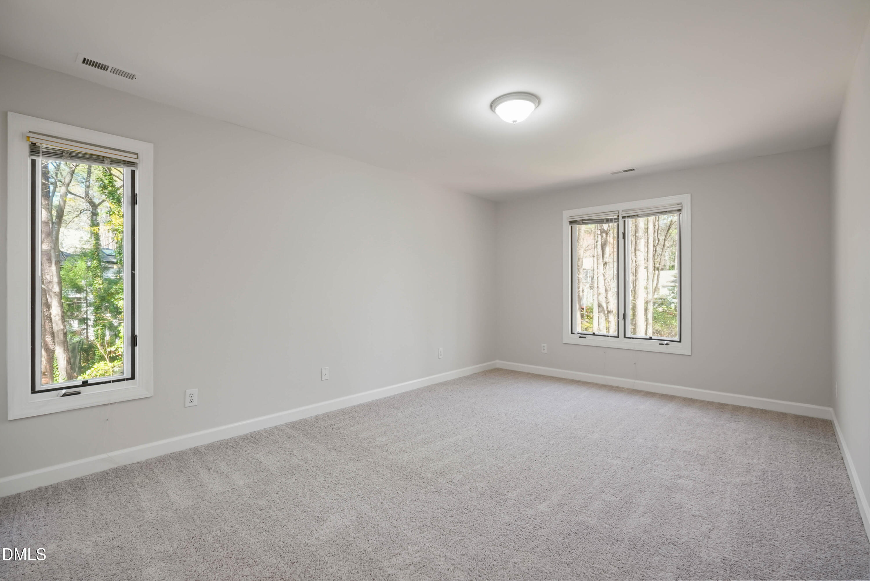 1500 Surfbird Court Raleigh, NC 27615 - Photo 31 of 47 an empty room with windows