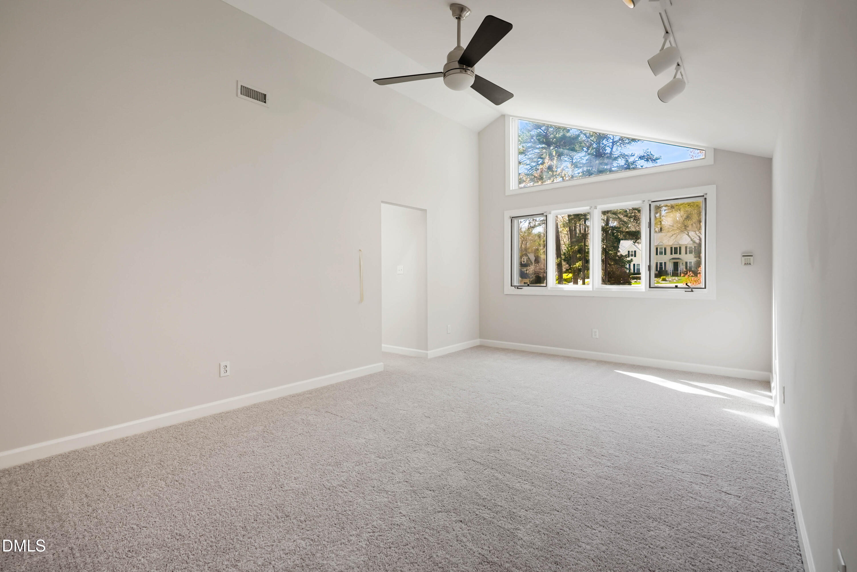 1500 Surfbird Court Raleigh, NC 27615 - Photo 36 of 47 a view of an empty room with a window