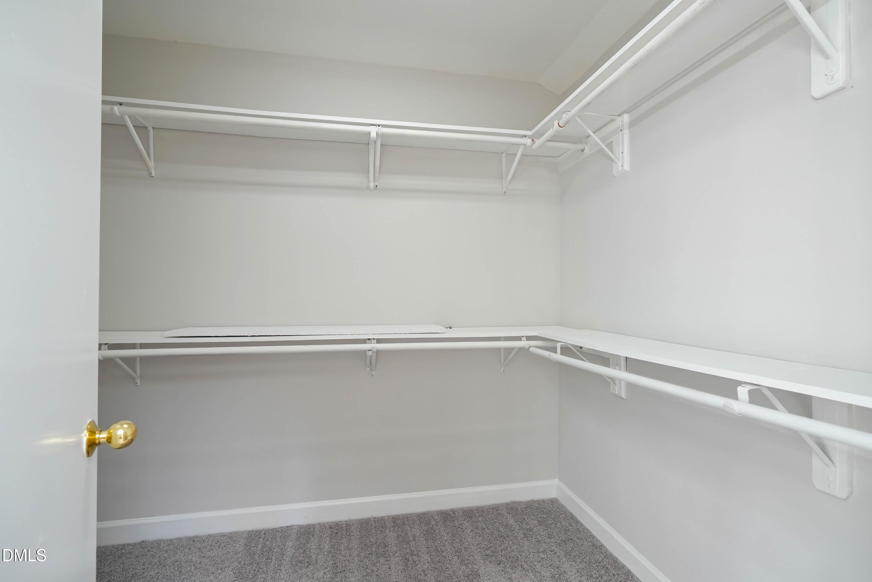 1500 Surfbird Court Raleigh, NC 27615 - Photo 38 of 47 a view of an empty walk in closet