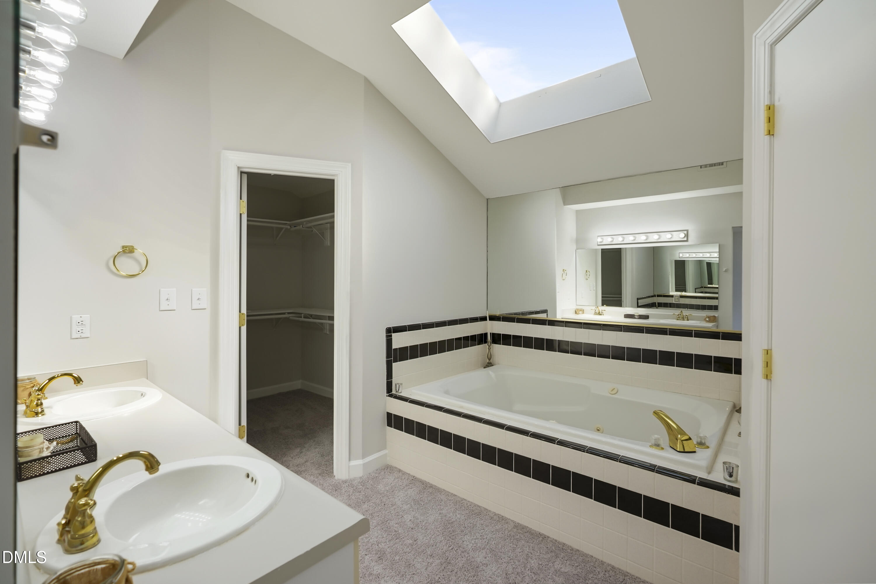 1500 Surfbird Court Raleigh, NC 27615 - Photo 39 of 47 a bathroom with a sink and a mirror