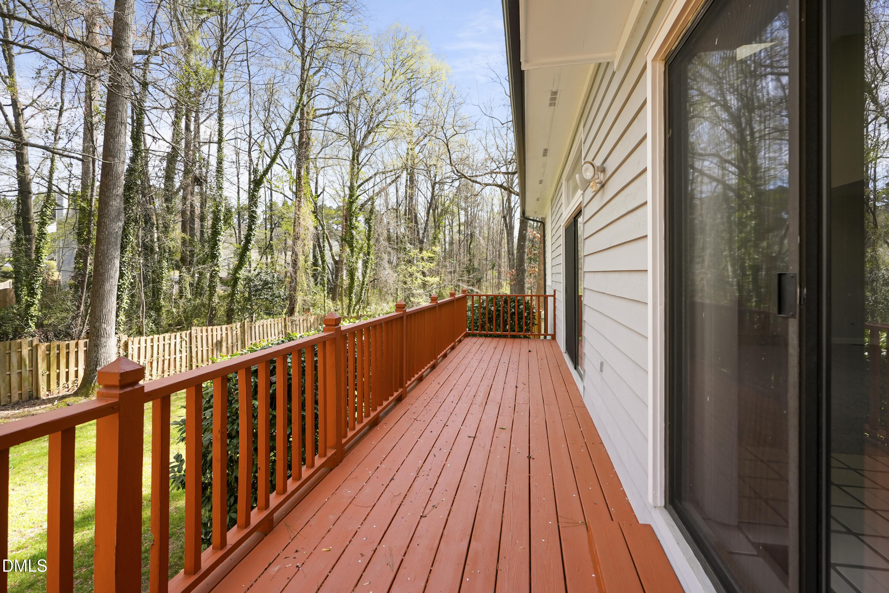 1500 Surfbird Court Raleigh, NC 27615 - Photo 43 of 47 a view of balcony with wooden floor and fence