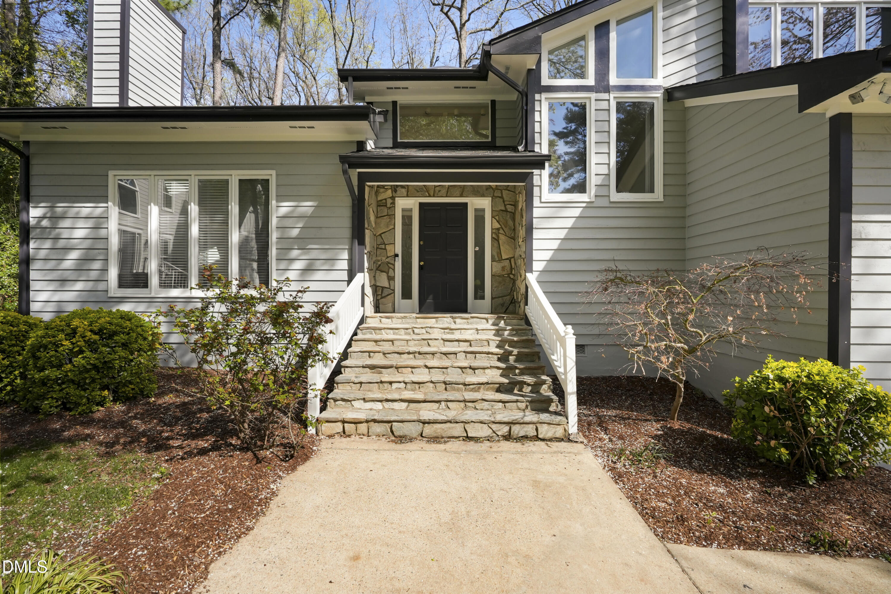 1500 Surfbird Court Raleigh, NC 27615 - Photo 5 of 47 a front view of a house with a garden