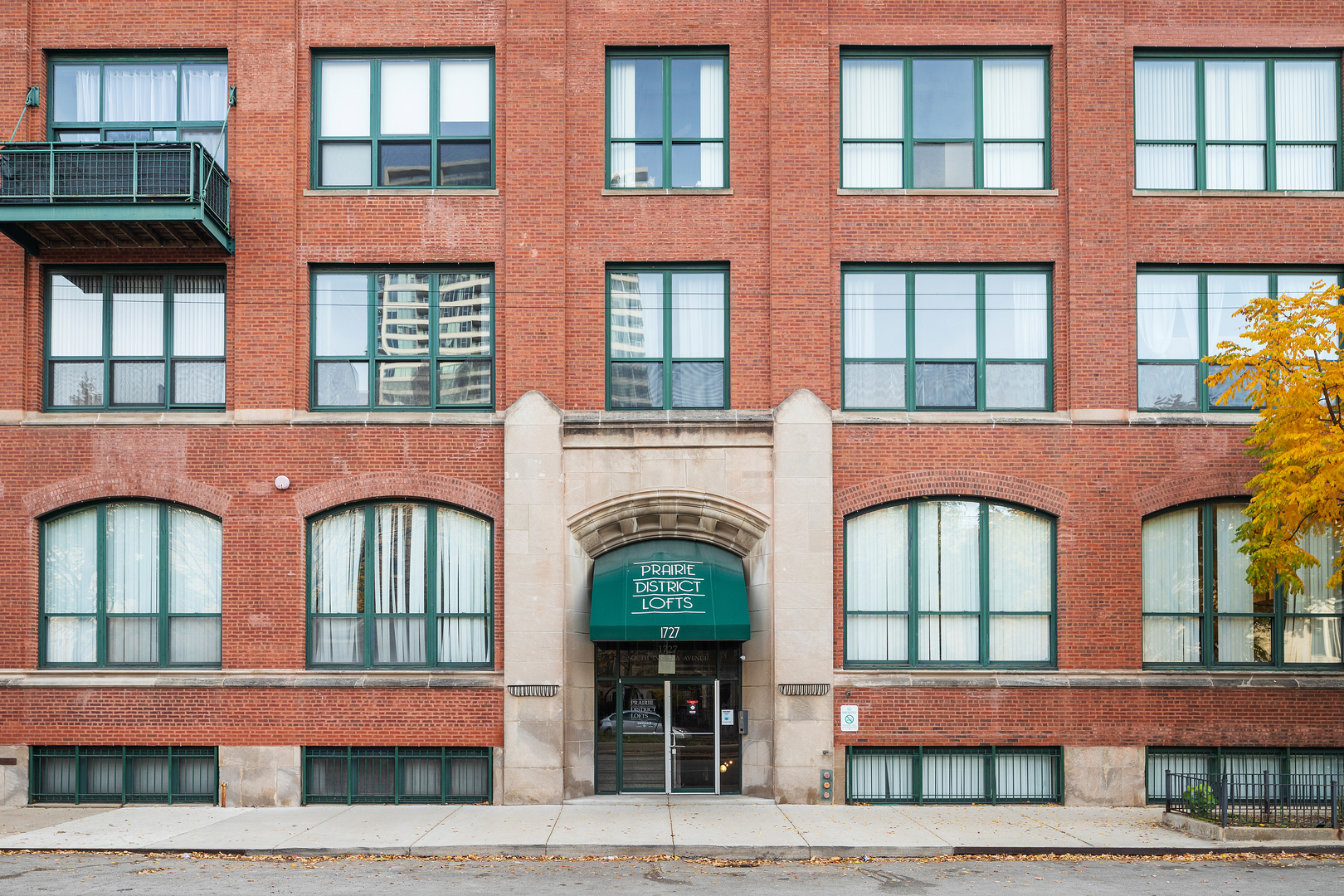 1727 South Indiana Avenue, Unit 319 Chicago, IL 60616 - Photo 2 of 21 a building with glass windows