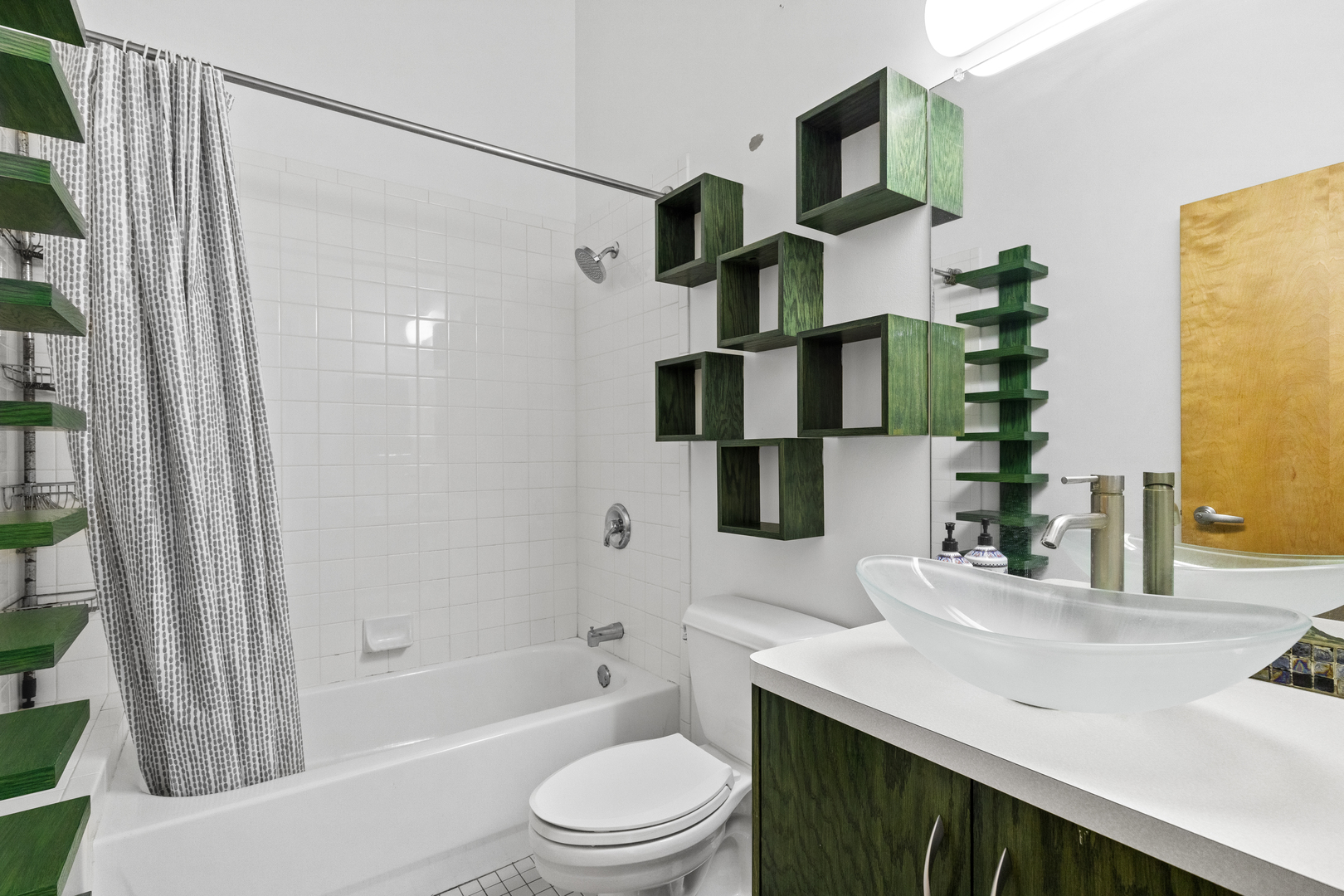 1727 South Indiana Avenue, Unit 319 Chicago, IL 60616 - Photo 20 of 21 a bathroom with a sink a toilet and shower