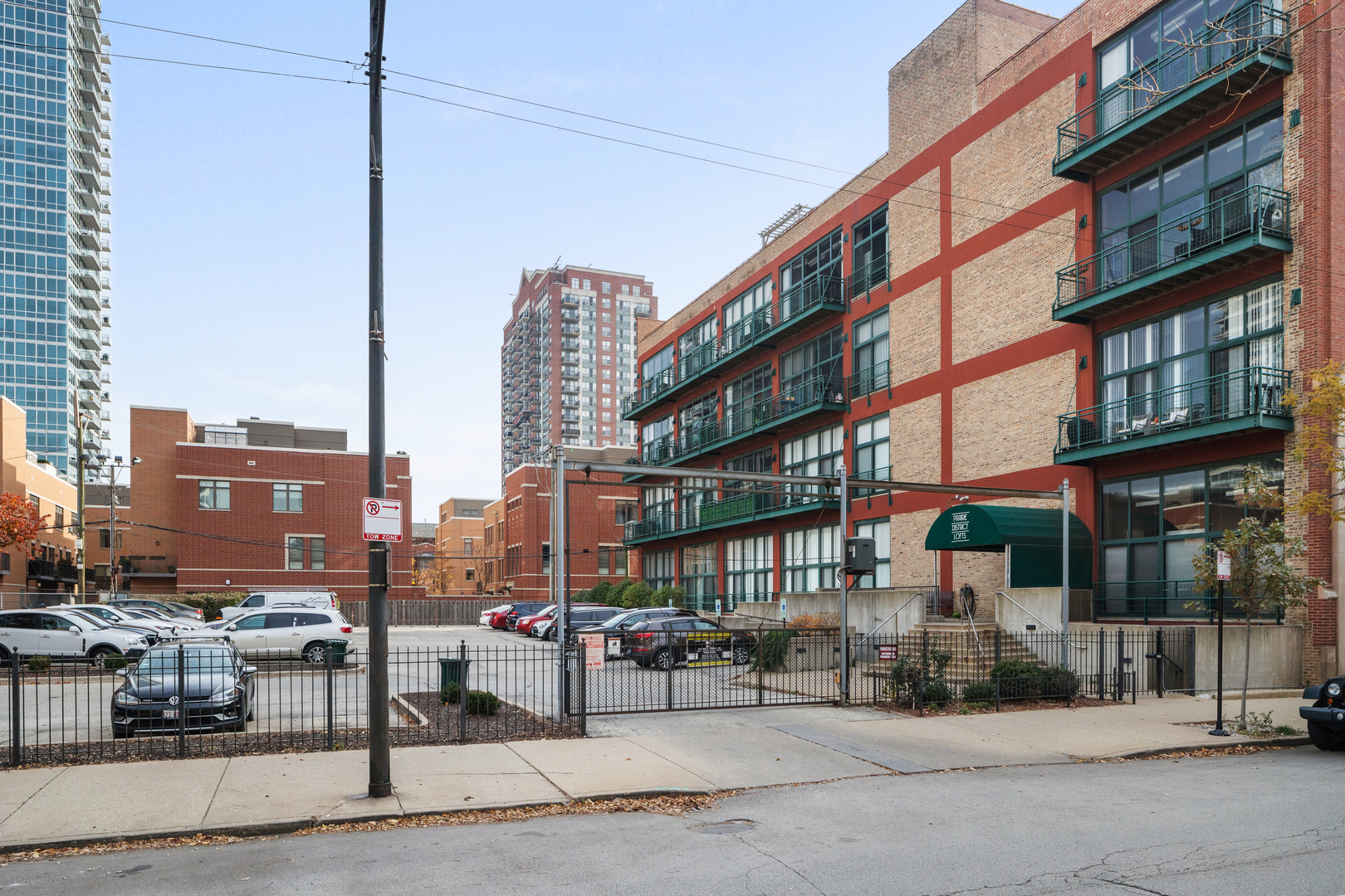 1727 South Indiana Avenue, Unit 319 Chicago, IL 60616 - Photo 3 of 21 a city street lined with tall buildings