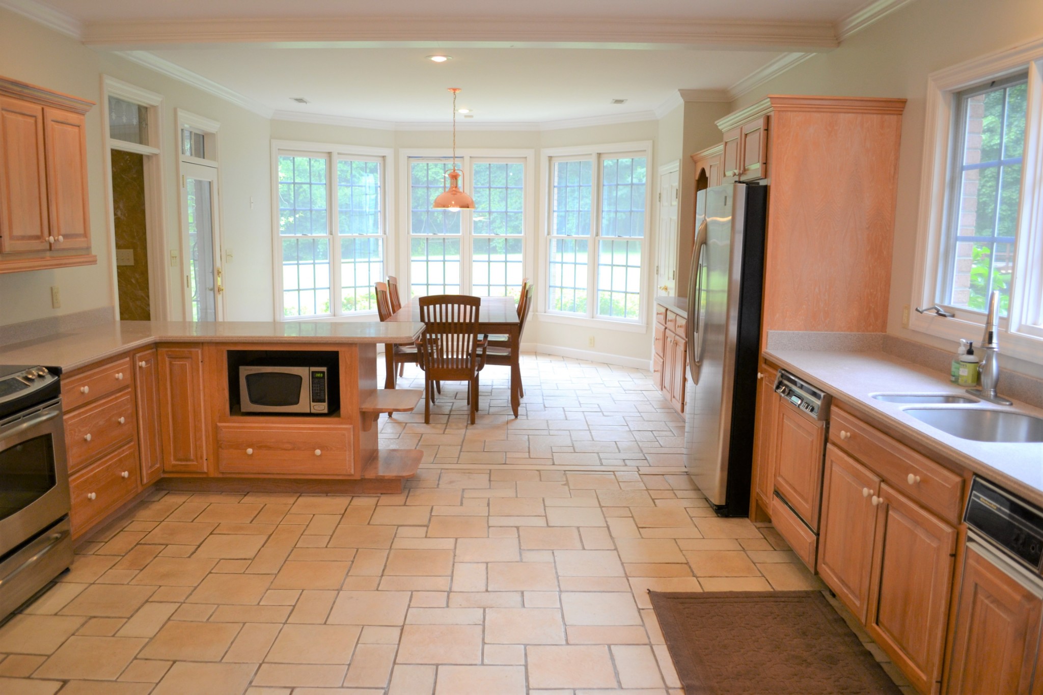 340 Shady Grove Road Flintville, TN 37335 - Photo 11 of 34 a kitchen with stainless steel appliances granite countertop a refrigerator and a stove top oven