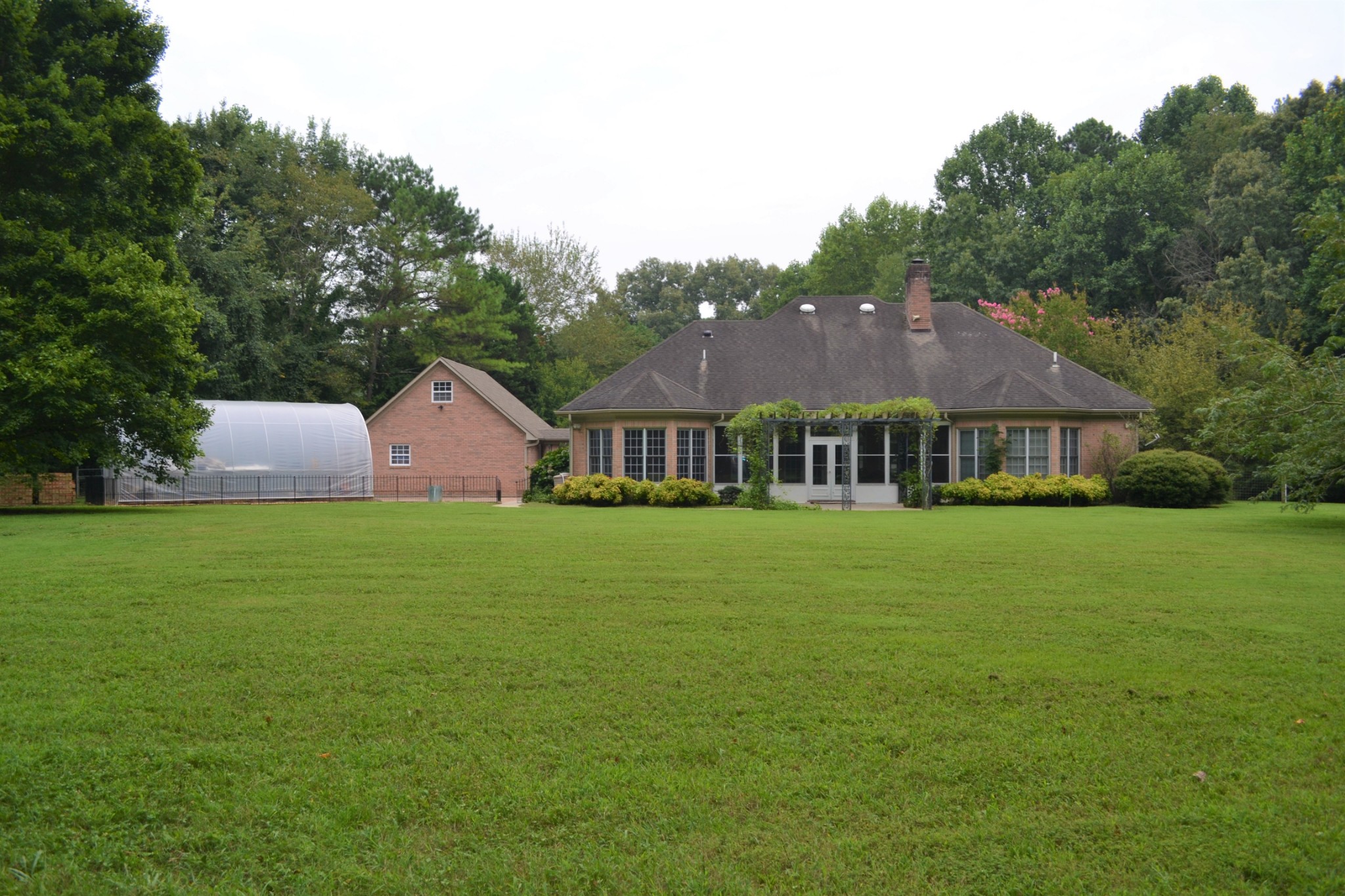 340 Shady Grove Road Flintville, TN 37335 - Photo 25 of 34 a front view of house with garden and trees
