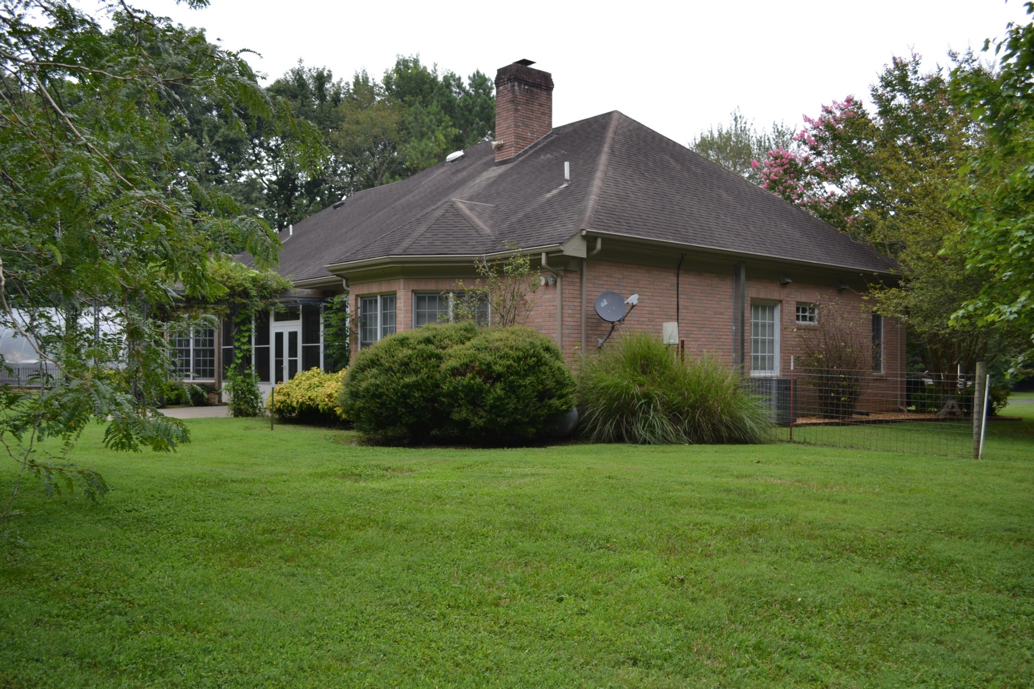 340 Shady Grove Road Flintville, TN 37335 - Photo 32 of 34 a front view of a house with a yard