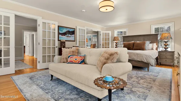 a view of a livingroom with furniture and a potted plant