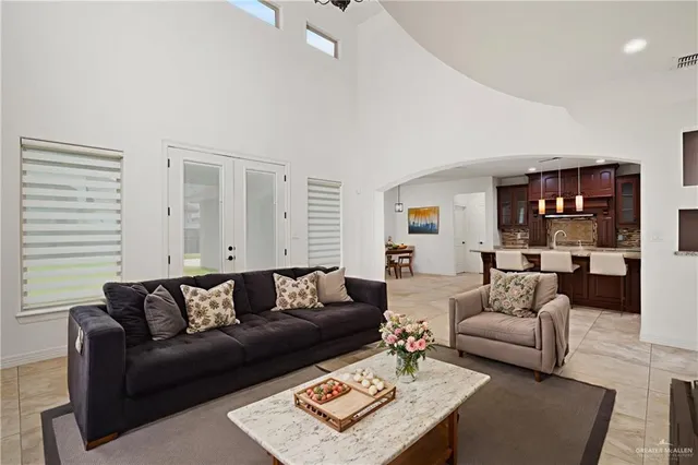 a living room with furniture and a rug