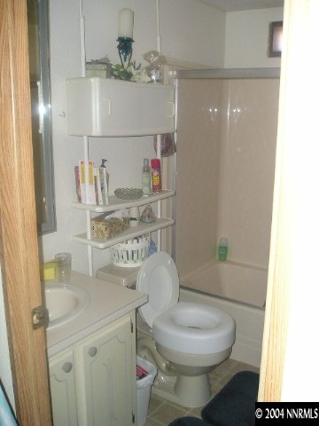 17325 Sunbird Lane Reno, NV 89508 - Photo 5 of 6 a bathroom with a toilet sink and shower