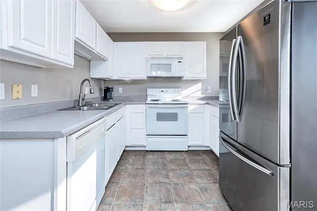 $185,000 | 1233 Woodland Point Drive, Unit H, St. Louis, MO 63146